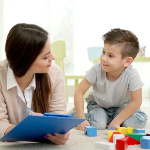 mom talking to son about preschool