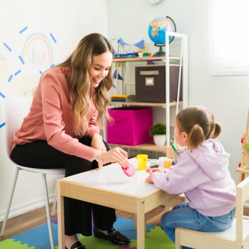 mom playing preschool with daughter